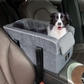 gray dog console car seat with pillow